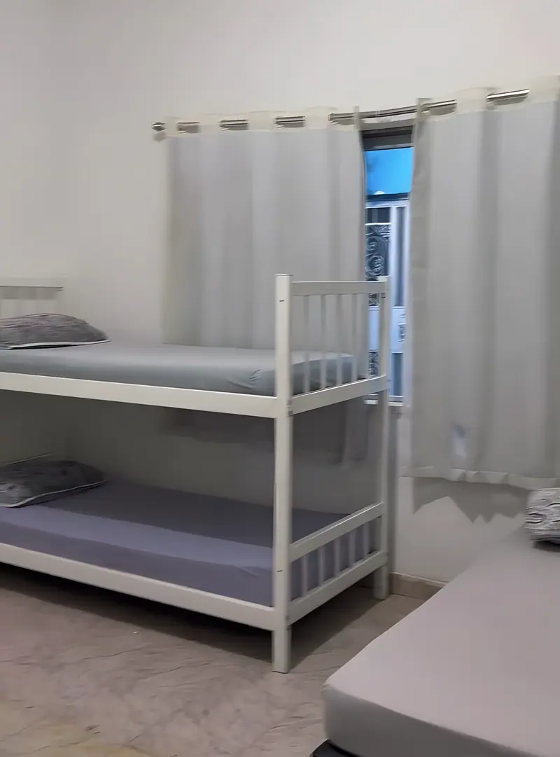 Quarto da Casa Azul com beliche e cama